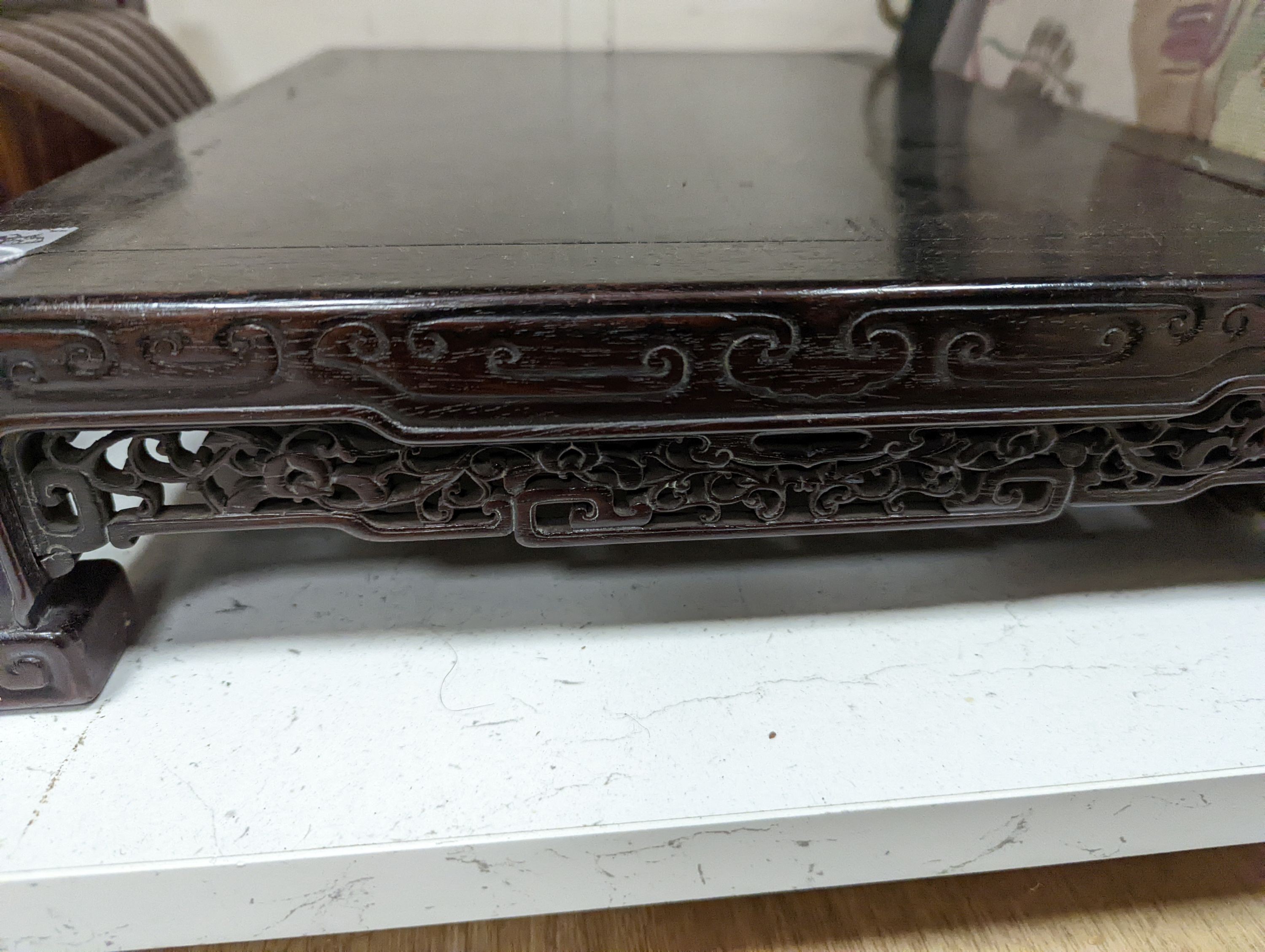 A 19th century Chinese hongmu low stand - 51cm long